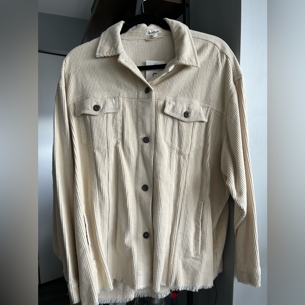 Cream corduroy shacket with frayed hem